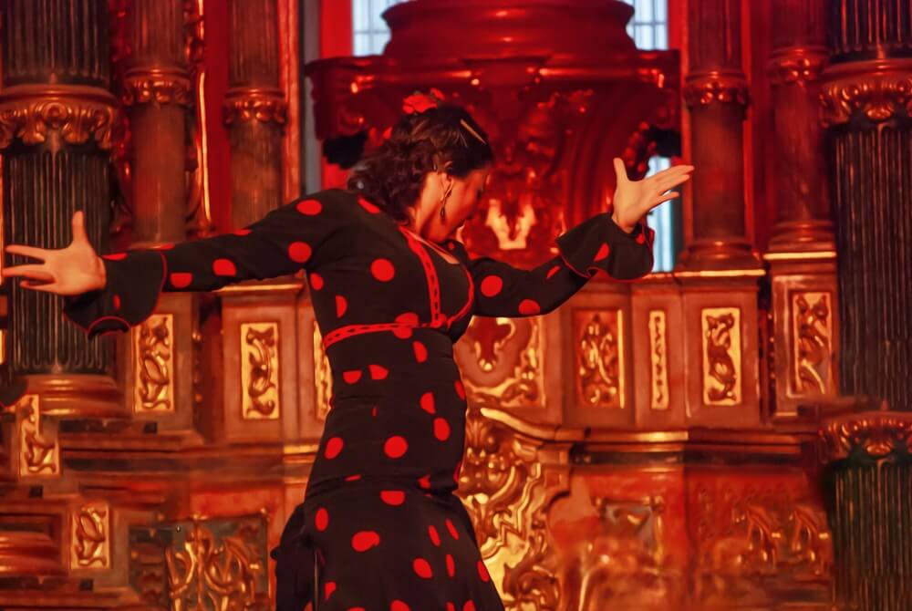 A flamenco dancer in Seville shows Spain's passion for dance to guests on a private tour.